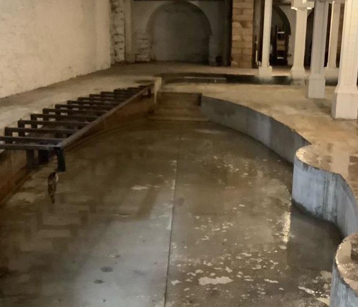 concrete floor cleaned after sewage loss