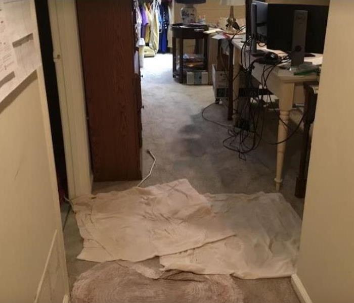 water damaged office in home