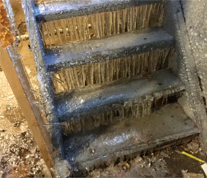 ice covering stairs in residential home 